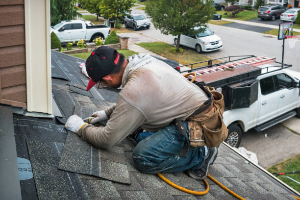 Professional Roofing technician working in Blue Point, NY